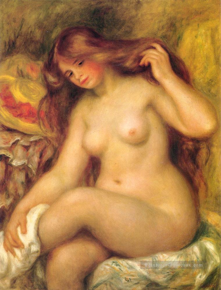 Baigneuse aux cheveux blonds femelle Nu Pierre Auguste Renoir Peintures à l'huile